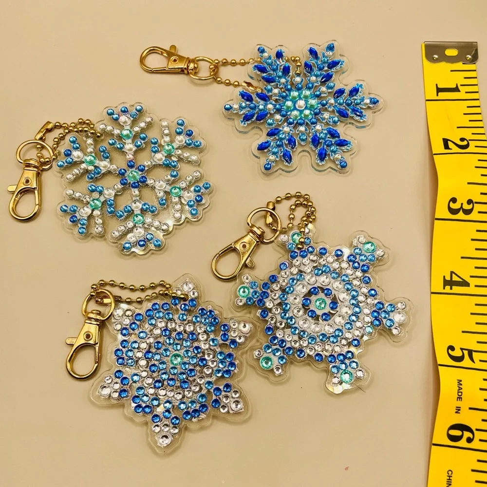 4 Christmas rhinestone snowflake ornaments. Handmade. Decorated on both sides.